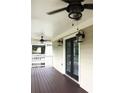 Cozy porch with ceiling fans and outdoor lighting, a great spot for relaxing and enjoying the outdoors at 1062 Lena Nw St, Atlanta, GA 30314