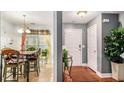 This home offers an inviting entrance and dining area with natural light at 338 Saratoga Pl, Riverdale, GA 30296