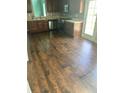 Kitchen with stainless steel appliances, wood cabinets and wood flooring at 750 Ambrose Ln, Atlanta, GA 30349