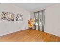 Bright bedroom with hardwood floors and natural light streaming through the window at 6057 Glencedar Ln, Atlanta, GA 30349