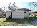 Back of a detached home with white siding and a small window at 692 Moreland Se Ave, Atlanta, GA 30316