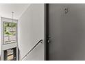 Hallway with apartment #3, bright window and stylish lighting at 449 Clairemont Ave # H3, Decatur, GA 30030