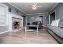 Cozy living room with a brick fireplace and neutral decor at 6391 Katherine St, Douglasville, GA 30134
