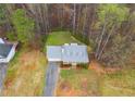 Bird's-eye view of home showcasing its setting and spacious lot at 118 Hunters Pl, Villa Rica, GA 30180