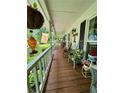 Relaxing front porch with rocking chairs and decor, creating a cozy and inviting outdoor space at 4114 Falcon Shores Nw Ct, Acworth, GA 30101
