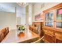 Classic dining room with wooden table, chairs, and china cabinet at 652 Trailwood Sw Ln, Marietta, GA 30064