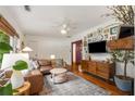 Cozy living room with hardwood floors, stylish furniture, and lots of natural light at 2119 Glenwood Se Ave, Atlanta, GA 30316