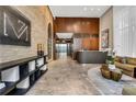Inviting lobby with brick accent wall, modern reception desk, and stylish decor at 867 Peachtree Ne St # 702, Atlanta, GA 30308