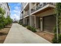 Charming townhome exteriors feature private garages and landscaped walkways, creating curb appeal at 658 Bull Se St, Atlanta, GA 30315