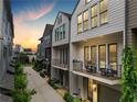 Townhome complex view at sunset, highlighting the stylish architecture and inviting outdoor living spaces at 658 Bull Se St, Atlanta, GA 30315