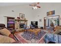 Spacious living room boasts vaulted ceilings, fireplace and an open layout at 680 Spirit Falls Way, Johns Creek, GA 30022