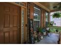Cozy front porch featuring decorative plants and a rustic 'WELCOME' sign at 4032 Duran Ln, Auburn, GA 30011