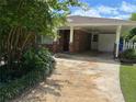 Charming brick home with covered parking and beautiful landscaping at 2711 Fairlane Dr, Atlanta, GA 30340
