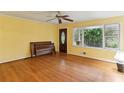 Bright living room featuring hardwood floors, a large window, and a classic design at 2711 Fairlane Dr, Atlanta, GA 30340