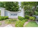Well-maintained landscaping surrounds The Vanderbilt community sign at 3071 Lenox Ne Rd # 19, Atlanta, GA 30324