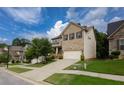 Attractive two-story brick home with a well-kept lawn and a spacious driveway at 565 Lance View Ln, Lawrenceville, GA 30045