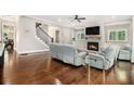 A spacious living room with a cozy fireplace, hardwood floors, and modern furnishings offers a relaxing retreat at 2638 Clairmont Rd, Atlanta, GA 30329