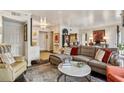 Bright living room featuring a comfortable sectional sofa and stylish decor at 275 13Th Ne St # 201, Atlanta, GA 30309