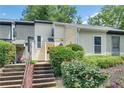 Two-story home with well-maintained landscaping and inviting front steps, offering great curb appeal at 764 Patterns Sw Dr, Mableton, GA 30126