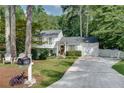 Inviting two-story home with a neatly landscaped front yard and a classic mailbox at the edge of the driveway at 2716 Meadow Ridge Nw Dr, Duluth, GA 30096