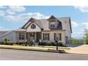 Stunning exterior elevation of a home with stone accents and well-manicured landscaping at 413 Horizon Trl, Canton, GA 30114
