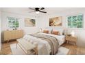 Serene bedroom featuring neutral tones, warm lighting, and two large windows, creating a bright and inviting space at 2702 Galaxy Ct, Decatur, GA 30034