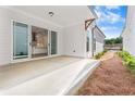 Spacious patio area with sliding glass doors, perfect for outdoor living and entertaining at 513 Godfrey Dr, Cumming, GA 30040