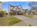 Suburban home showing the side and front featuring well manicured lawn and driveway at 610 Syemore Pass, Canton, GA 30115