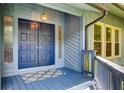 Close-up of the entryway with a double door and classic overhead light fixture at 3531 Evans Ridge Dr, Atlanta, GA 30341