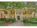 Traditional brick condo with mature trees and landscaping at 3650 Ashford Dunwoody Ne Rd # 1024, Atlanta, GA 30319