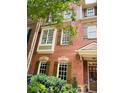 Beautiful brick townhouse showcasing classic architectural details and well-maintained facade at 578 Parkside Village Nw Way, Marietta, GA 30060