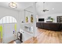 Inviting foyer with hardwood floors, leading to a bright living area at 1400 Land Rd, Canton, GA 30114
