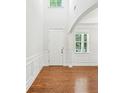 Bright and spacious foyer with hardwood floors, white trim, and a welcoming atmosphere at 1648 Danbury Parc Ne Pl, Brookhaven, GA 30319