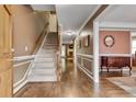 Foyer features hardwood floors, stairway, and access to the dining room and living areas at 1685 Frazier Park Dr, Decatur, GA 30033