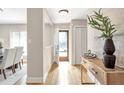 Bright foyer with hardwood floors and view to dining area at 17 Ivy Gates Ne, Atlanta, GA 30342