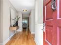 Inviting entryway with hardwood floors, stylish console table, and neutral wall color at 17 Ivy Gates Ne, Atlanta, GA 30342
