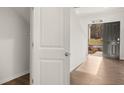 Entryway featuring hardwood floors, a coat closet, and views to the outside at 502 Oak View Ln, Dallas, GA 30157