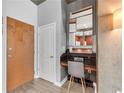 The front entry has an integrated desk and plenty of storage at 860 Peachtree Ne St # 1806, Atlanta, GA 30308