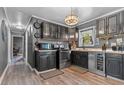 Updated kitchen with stainless steel appliances, dark cabinetry, and a sleek design, perfect for culinary enthusiasts at 5143 3Rd St, Morrow, GA 30260