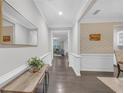 Bright and spacious hallway with modern decor and elegant wood flooring at 1840 Tululah Trl, Smyrna, GA 30082