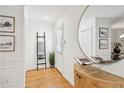 Bright entryway with wood floors, decor, and white walls at 1634 Ponce De Leon Ne Ave # 514, Atlanta, GA 30307