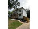 Stylish two-story home featuring a welcoming front porch and modern design elements at 1962 Compton Se Dr, Atlanta, GA 30315