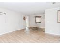 Spacious living room with laminate floors and a decorative mirror at 3133 Cottonwood Se Dr, Atlanta, GA 30316