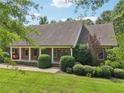 Lovely brick home with a cozy front porch, perfect for relaxing outdoors at 169 Robson Trl, Mcdonough, GA 30252