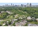 Fantastic aerial view showcasing the property's proximity to Piedmont Park, the Beltline, and the Atlanta Botanical Garden at 1376 Parkview Ne Ln, Atlanta, GA 30324