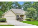 Charming one-story home featuring a two-car garage, well-kept lawn, and mature trees, ideal for comfortable living at 2676 Varner Ne Dr, Atlanta, GA 30345