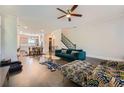 A spacious living room with hardwood floors, modern furnishings, and an open floor plan at 816 S Columbia Dr, Decatur, GA 30030
