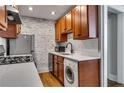 Efficient kitchen with stainless steel appliances and in-unit washer/dryer at 733 Frederica Ne St # 7, Atlanta, GA 30306