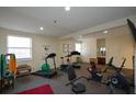 Well-equipped fitness center with treadmills, stationary bikes, and ample space for exercise routines at 475 Mount Vernon Ne Hwy # C-220, Sandy Springs, GA 30328