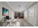 Bright home office space with modern desk, built-in shelving, and natural light at 2183 Ramblewood Cir, Decatur, GA 30035